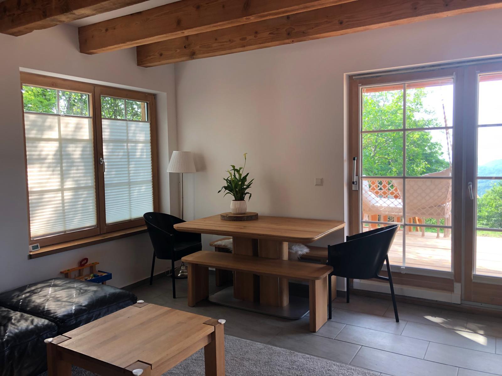 Living room dining with timber finishes